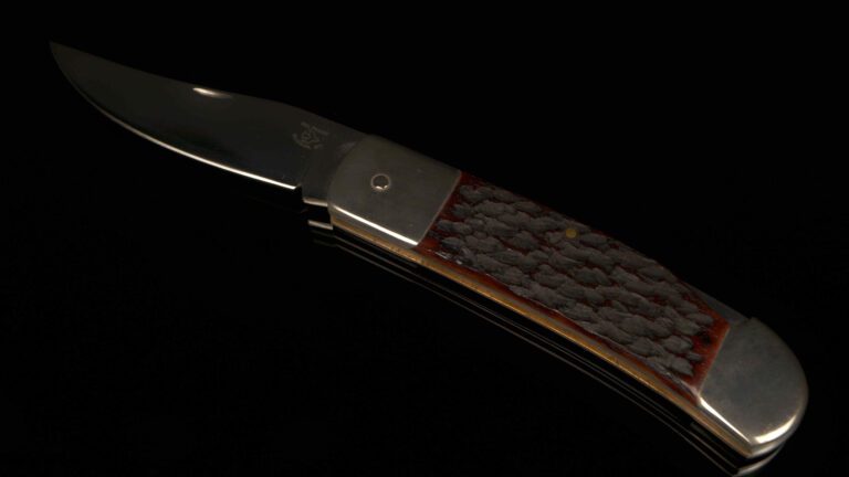 Mel Fassio Lockback folder