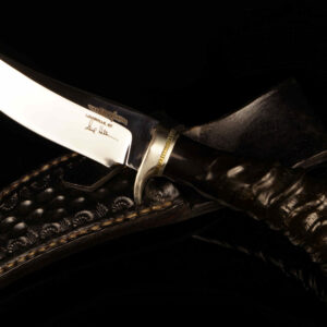 Gil Hibben Handmade Hunting Knife with Carved Horn Handle and Tooled Sheath