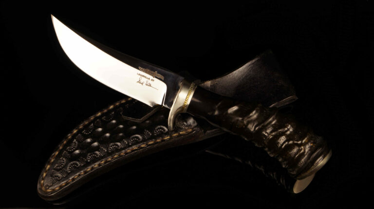 Gil Hibben Handmade Hunting Knife with Carved Horn Handle and Tooled Sheath
